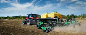 Strip-till equipment applying fertilizer